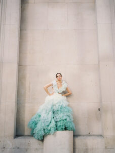 stunning model in a vibrant ombre ruffled dress